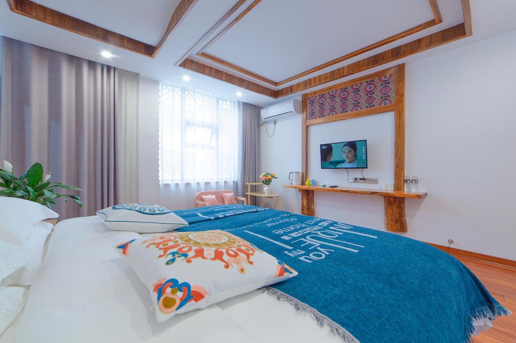 Отель Easy House Чжанцзяцзе Экстерьер фото