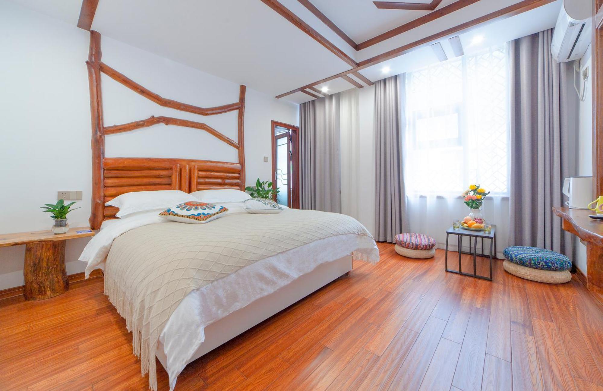 Отель Easy House Чжанцзяцзе Экстерьер фото
